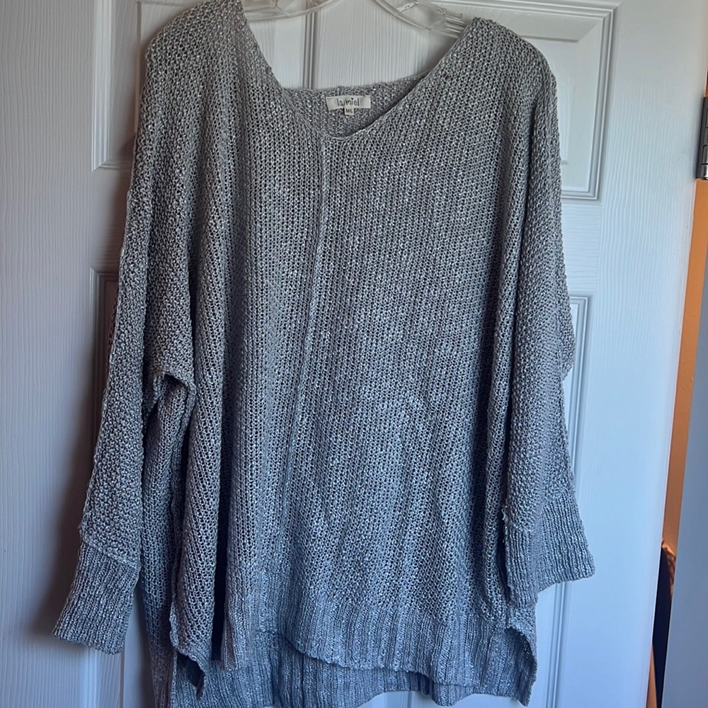 Brand new women’s M/L gray sweater